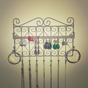 Gray metal wall jewelry holder